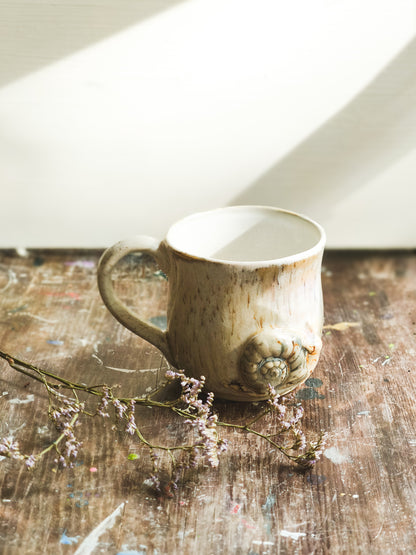 Ceramic cup with snail