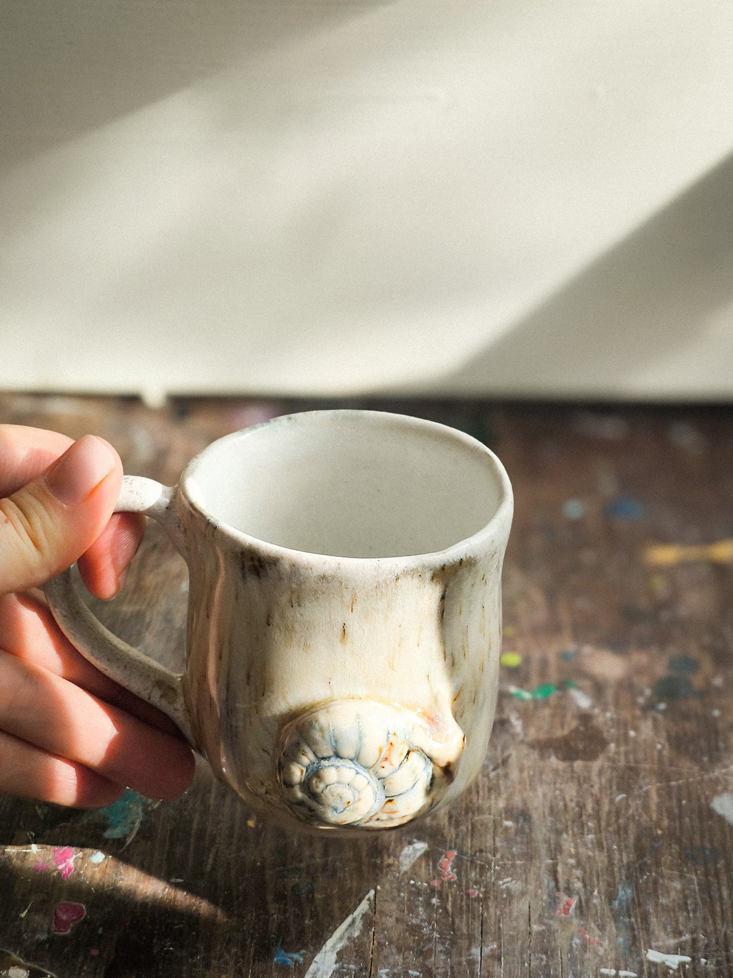 Ceramic cup with snail