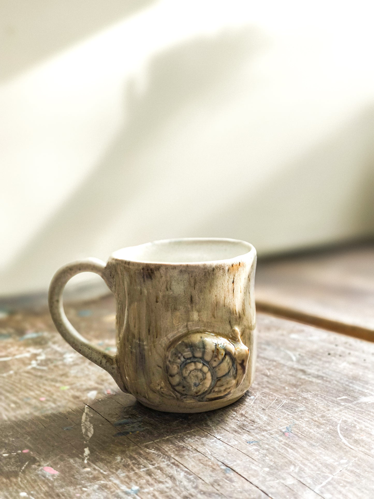 Ceramic cup with snail