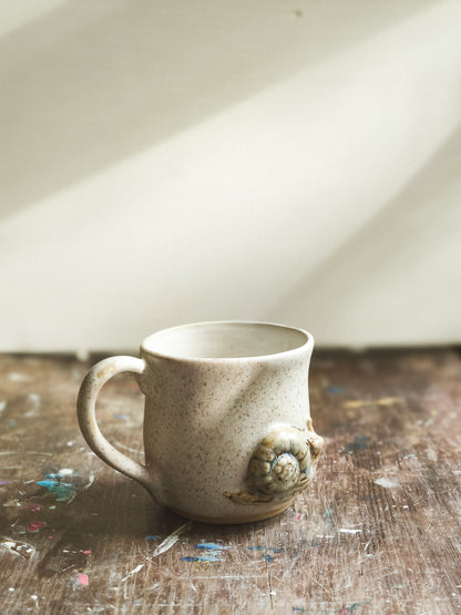 Ceramic cup with snail