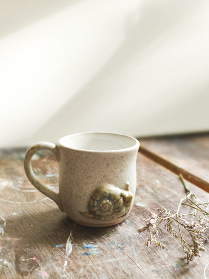 Ceramic cup with snail