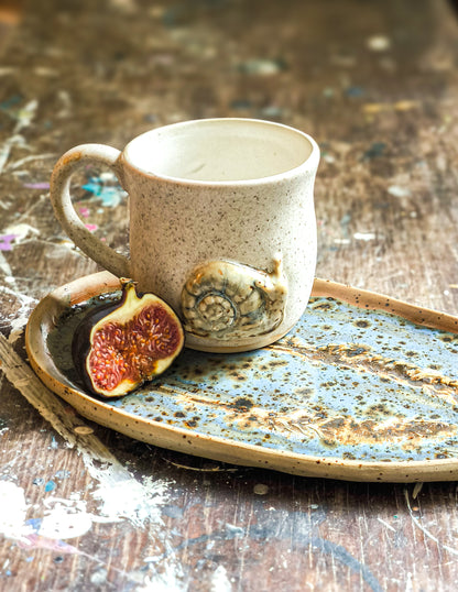 Ceramic cup with snail