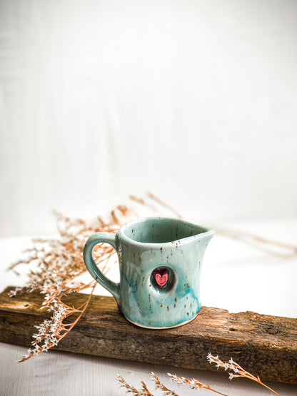 Ceramic milk jug with a heart motif